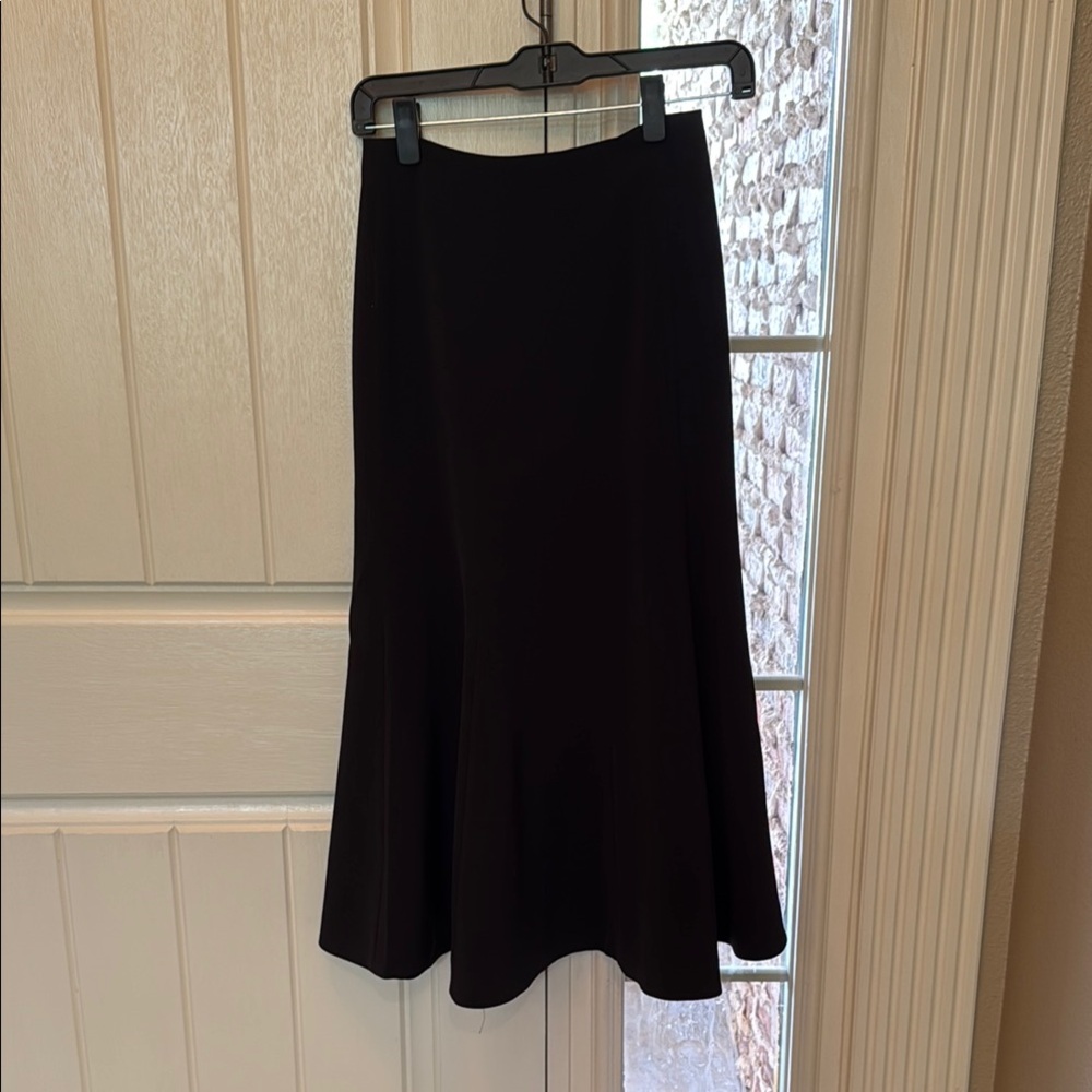 Club Monaco Classic Black Midi Skirt
31 inches in length
